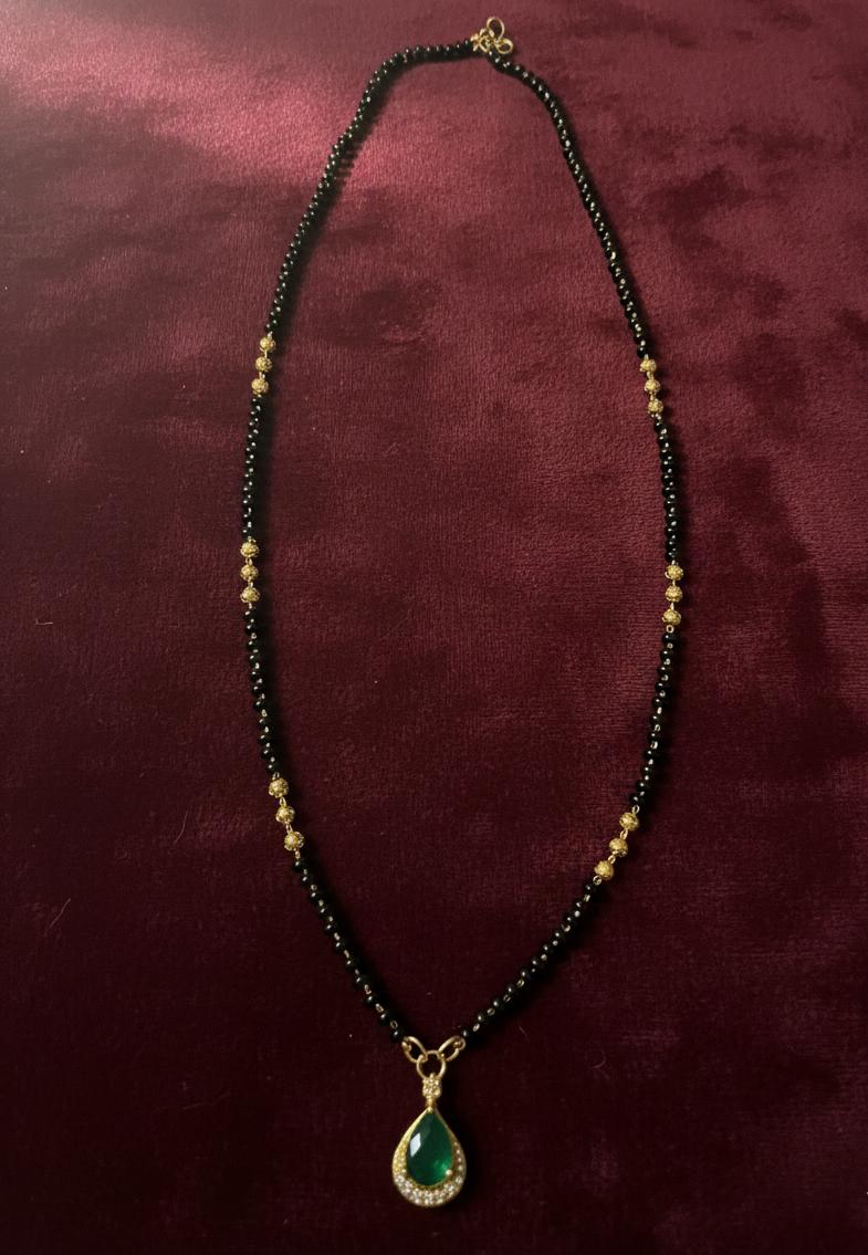 Green locket golden ball karimani necklace